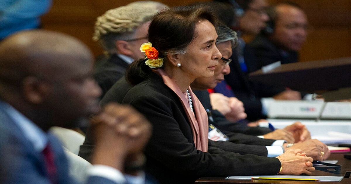 Myanmar`s leader Aung San Suu Kyi and Gambia`s justice minister Aboubacarr Tambadou, left, listen to judges in the court room of the International Court of Justice for the first day of three days of hearings in The Hague, Netherlands, Tuesday, 10 December 2019. Photo: UNB