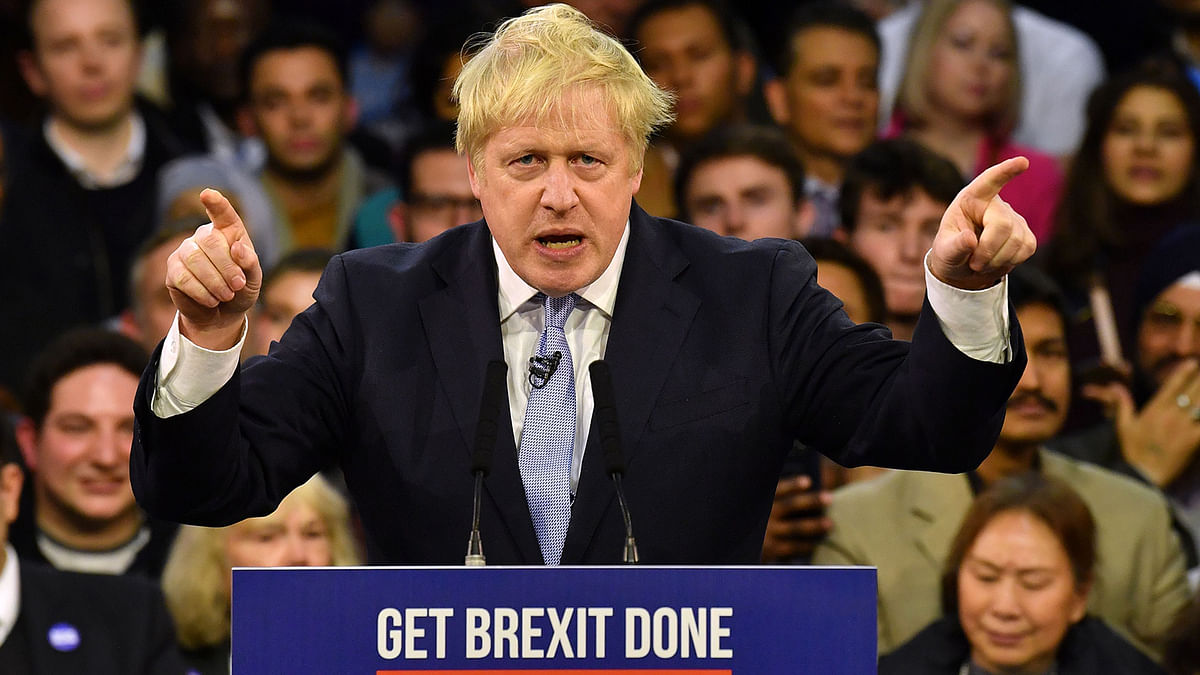 Britain`s prime minister and Conservative party leader Boris Johnson speaks during a general election campaign rally in East London on 11 December 2019, the final day of campaigning for the general election. Photo: AFP