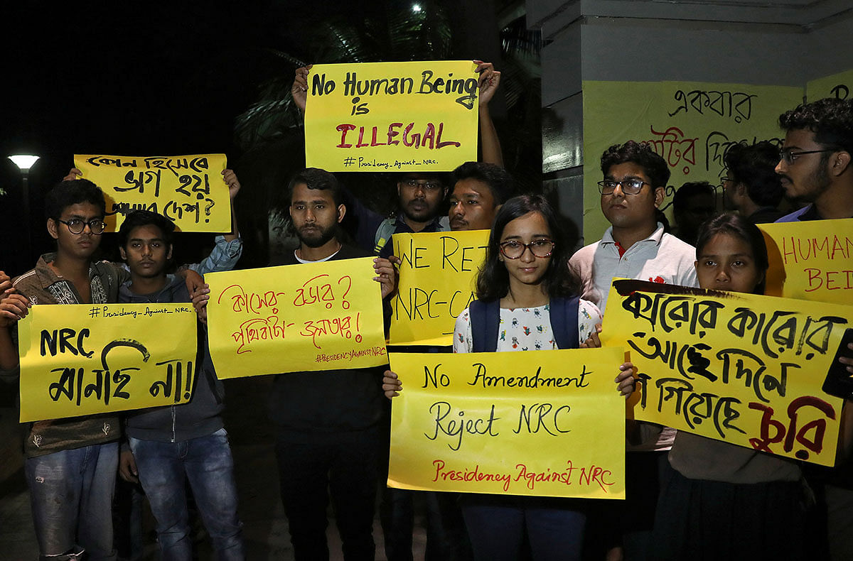 Students display placards as they attend a protest against the National Register of Citizens (NRC) and the Citizenship Amendment Bill (CAB), a bill that seeks to give citizenship to religious minorities persecuted in neighbouring Muslim countries, in Kolkata, India on 10 December. Photo: Reuters