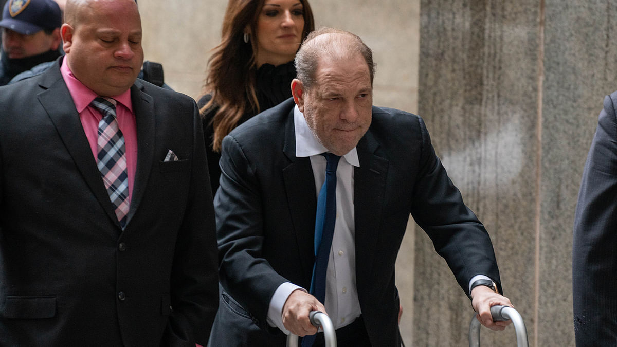 Movie producer Harvey Weinstein arrives at criminal court on 11 December 2019 in New York City. Photo: AFP  `Harvey Weinstein reaches $25m settlement with accusers`