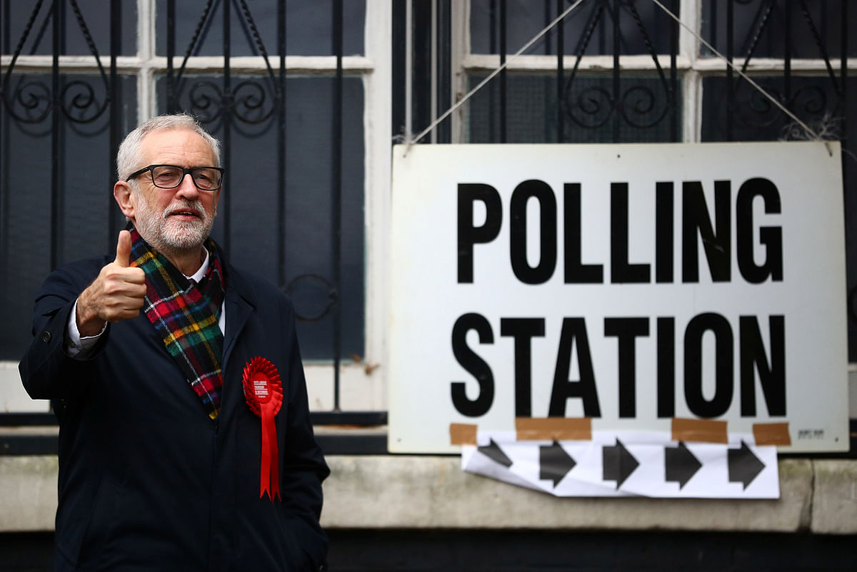Britain`s opposition Labour Party leader Jeremy Corbyn poses outside a polling station after voting in the general election in London, Britain, 12 December, 2019. Photo: Reuters