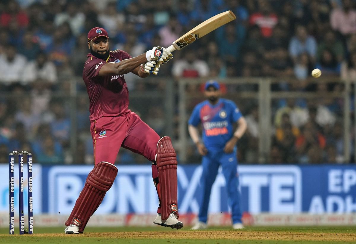 West Indies` Kieron Pollard plays a shot during the third T20 international cricket match of a three-match series between India and West Indies at the Wankhede Stadium in Mumbai, on 11 December 2019. Photo: AFP