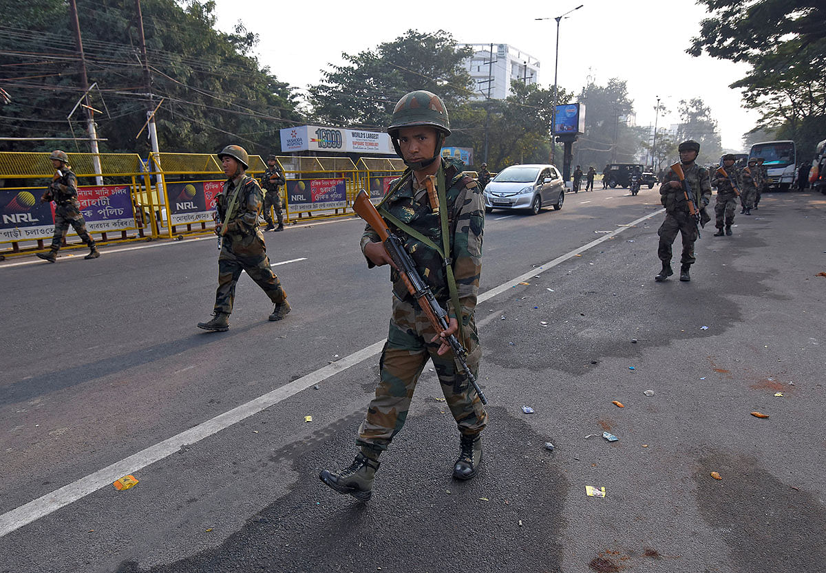 Soldiers patrol a street following protests after India`s parliament passed Citizenship Amendment Bill, in Guwahati, India on 12 December 2019. Photo: Reuters