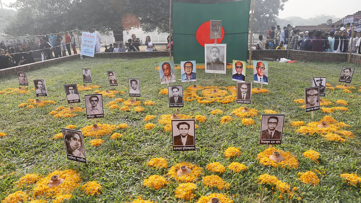 Flowers placed at the Martyred Intellectuals Memorial in Mirpur, Dhaka on 14 December 2019 to commemorate the Bangladeshi intellectuals killed by the Pakistani occupying forces in 1971. Photo: Tanvir Ahmed