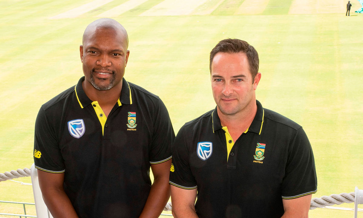 Enoch Nkwe(L), the South African Cricket assistant coach, and Mark Boucher(R), the South African Cricket coach, pose for a portrait at the Newlands Cricket grounds in Newlands, on Saturday. Photo: AFP