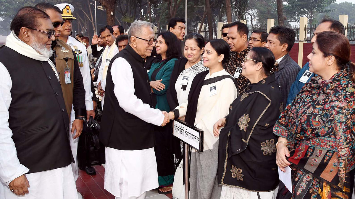 President Abdul Hamid talks to the family members of the martyred intellectuals and enquires about their wellbeing after paying respect to the martyred intellectuals on the occasion of Martyred Intellectuals Day at the Martyred Intellectuals Memorial in Mirpur, Dhaka on 14 December 2019. Photo: PID