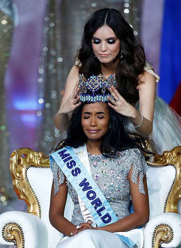 Miss World 2018 Vanessa Ponce de Leon of Mexico puts a crown on the head of Toni Ann Singh of Jamaica celebrating winning the Miss World title in London, Britain on 14 December 2019. Photo: Reuters