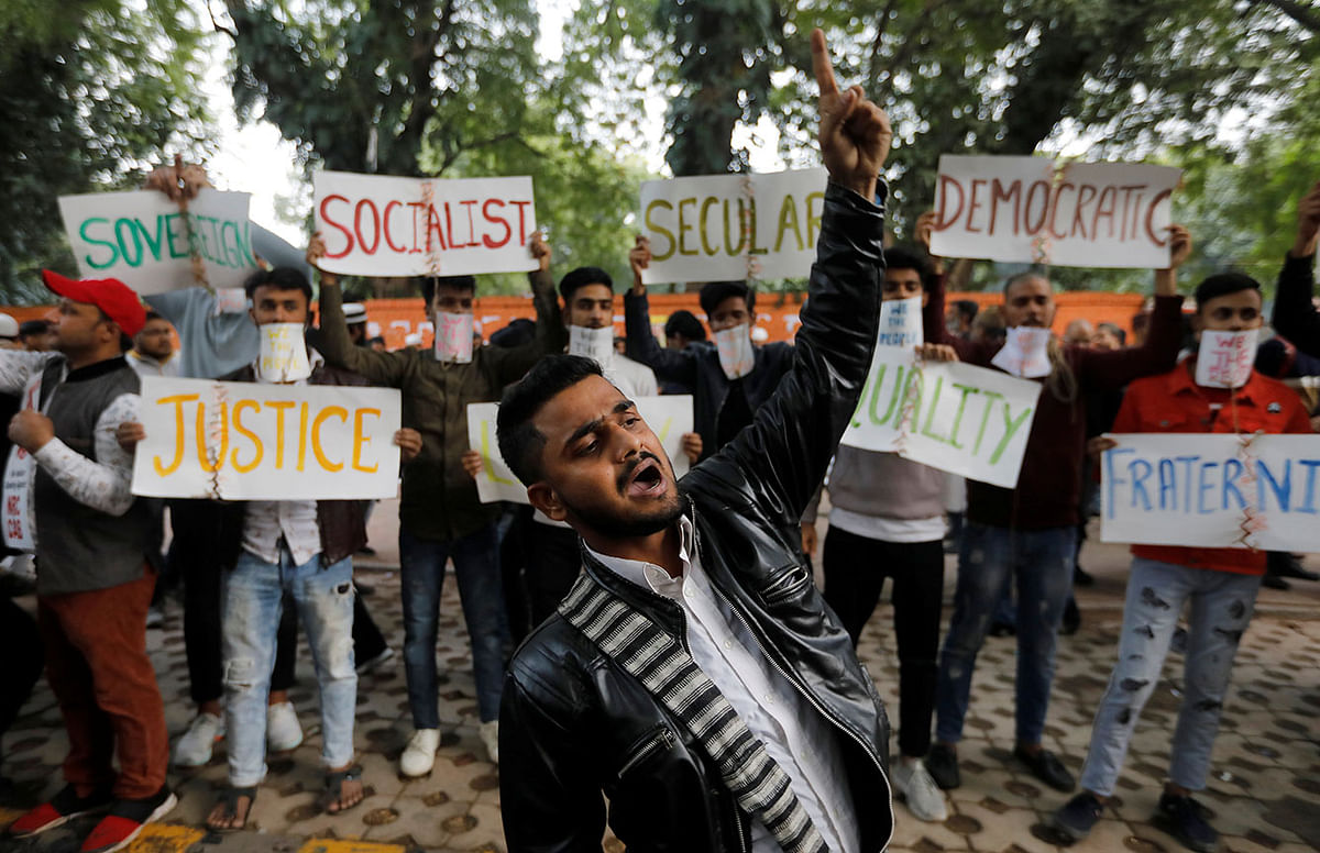 Protesters shout slogans during a protest against the Citizenship Amendment Bill that seeks to give citizenship to religious minorities persecuted in neighbouring Muslim countries, in New Delhi, India, on 14 December 2019. Photo: Reuters