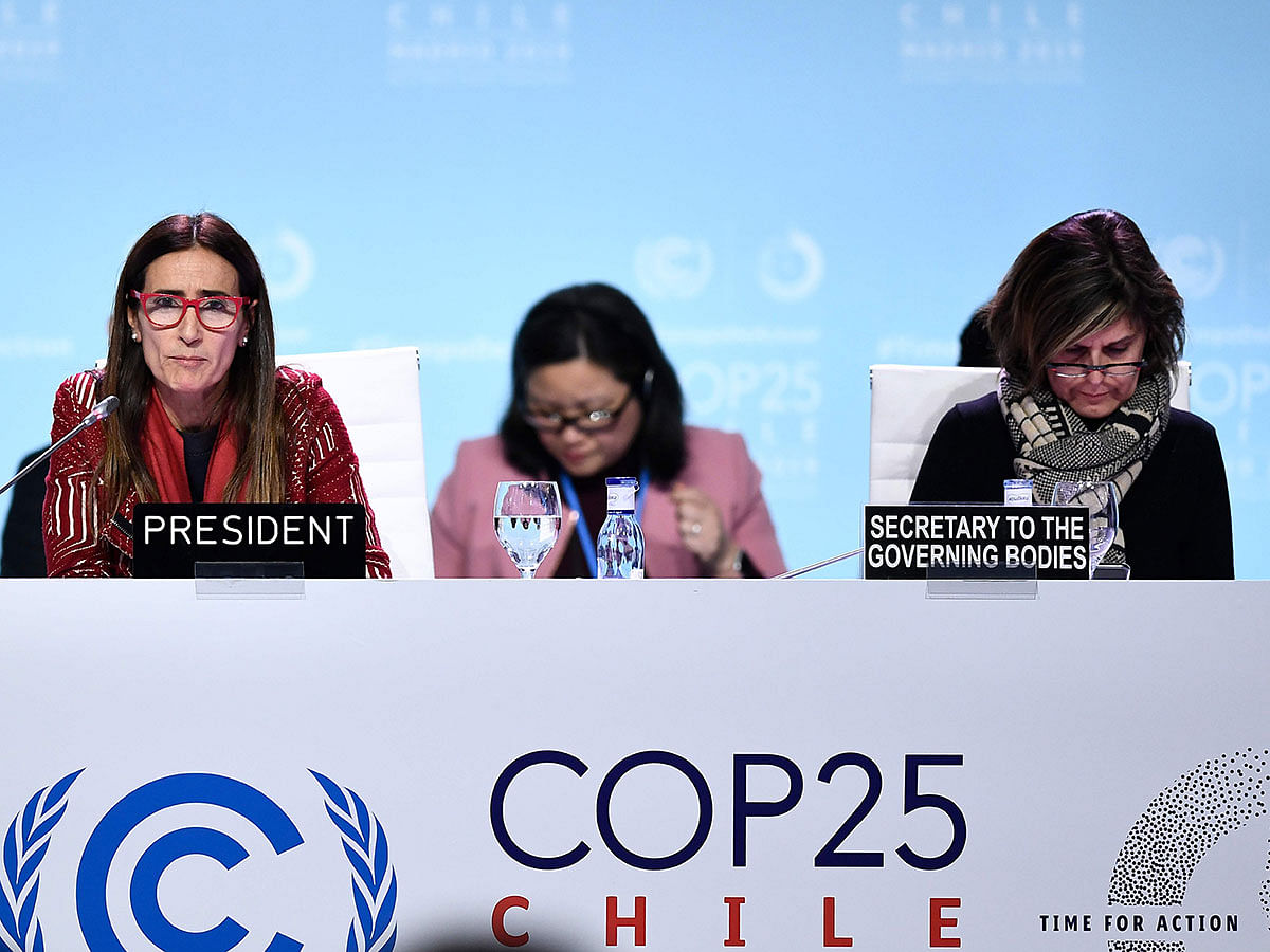 Chile`s environment minister and COP25 president Carolina Schmidt (L) attends an Informal Presidency stock-taking plenary during the UN Climate Change Conference COP25 at the `IFEMA - Feria de Madrid` exhibition centre, in Madrid, on 15 December 2019. Photo: AFP
