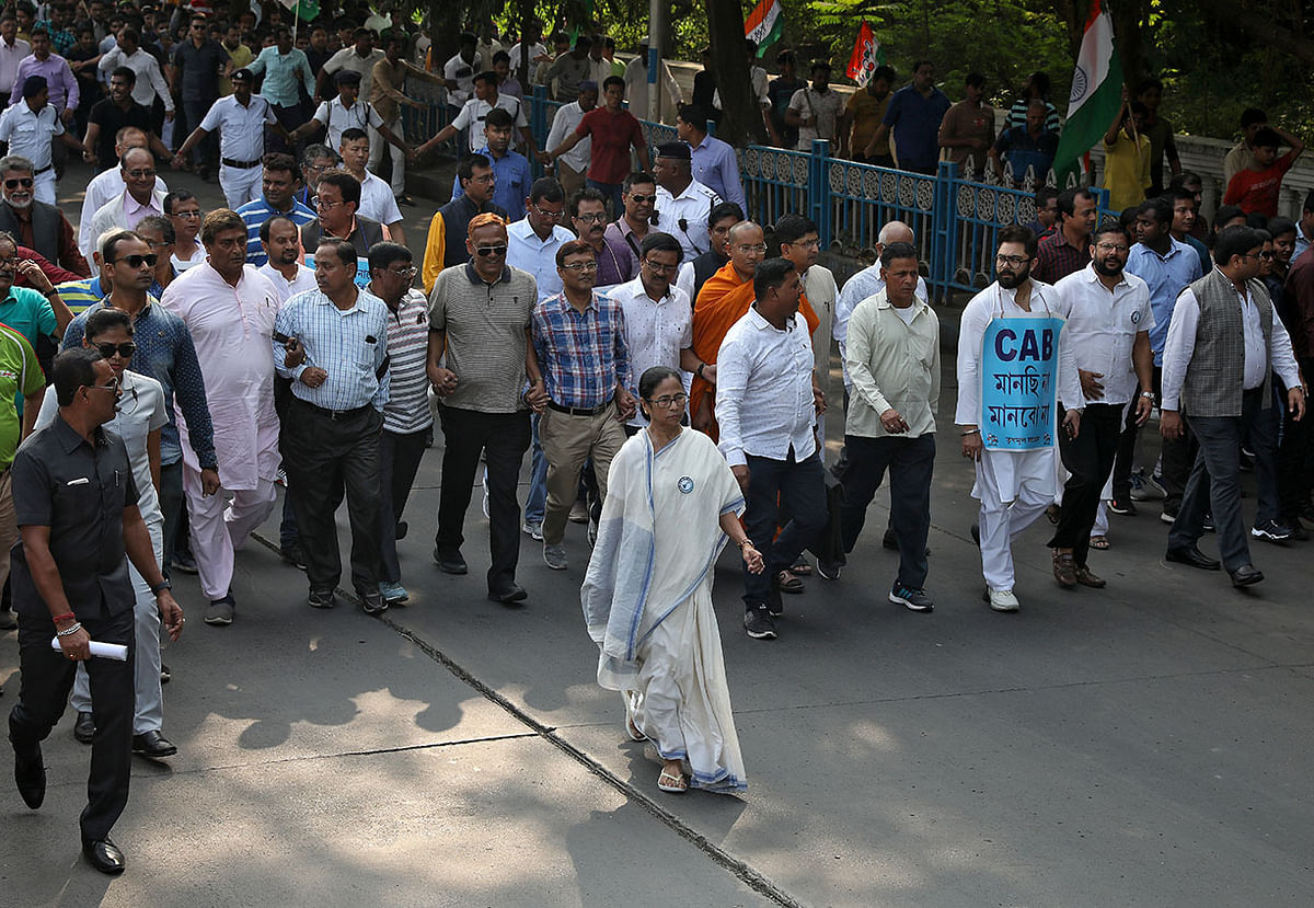 Mamata Banerjee, the chief minister of West Bengal, and her party supporters attend a protest march against the National Register of Citizens (NRC) and a new citizenship law, in Kolkata, India, on 16 December 2019. Photo: Reuters