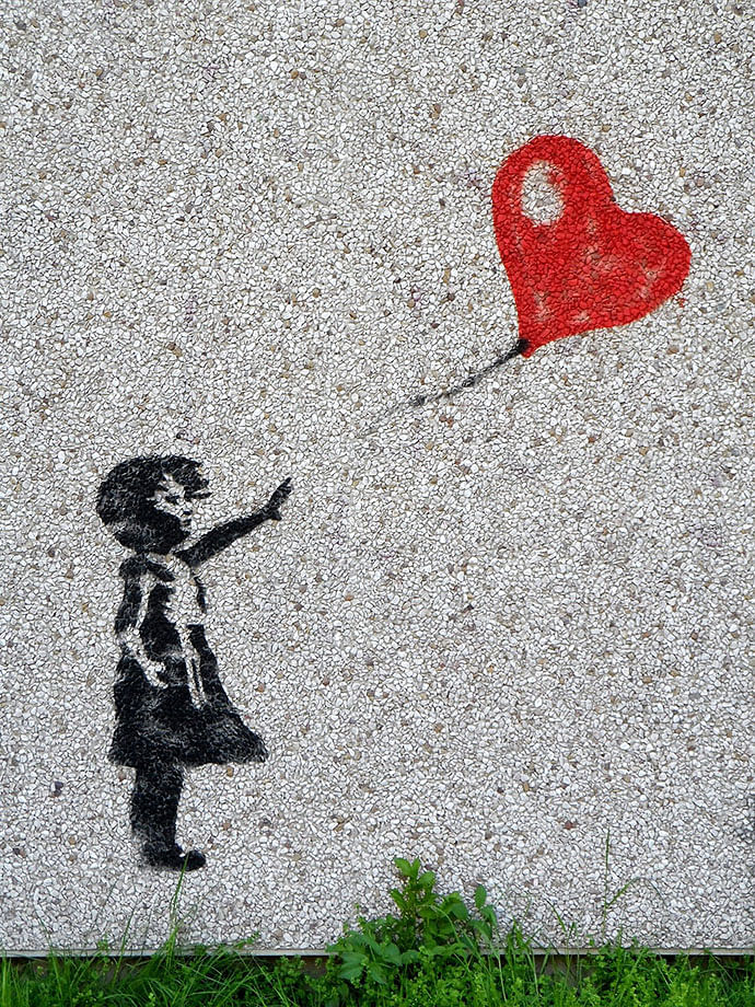 Banksy’s graffiti depicting a girl with a balloon. Photo: Pixabay