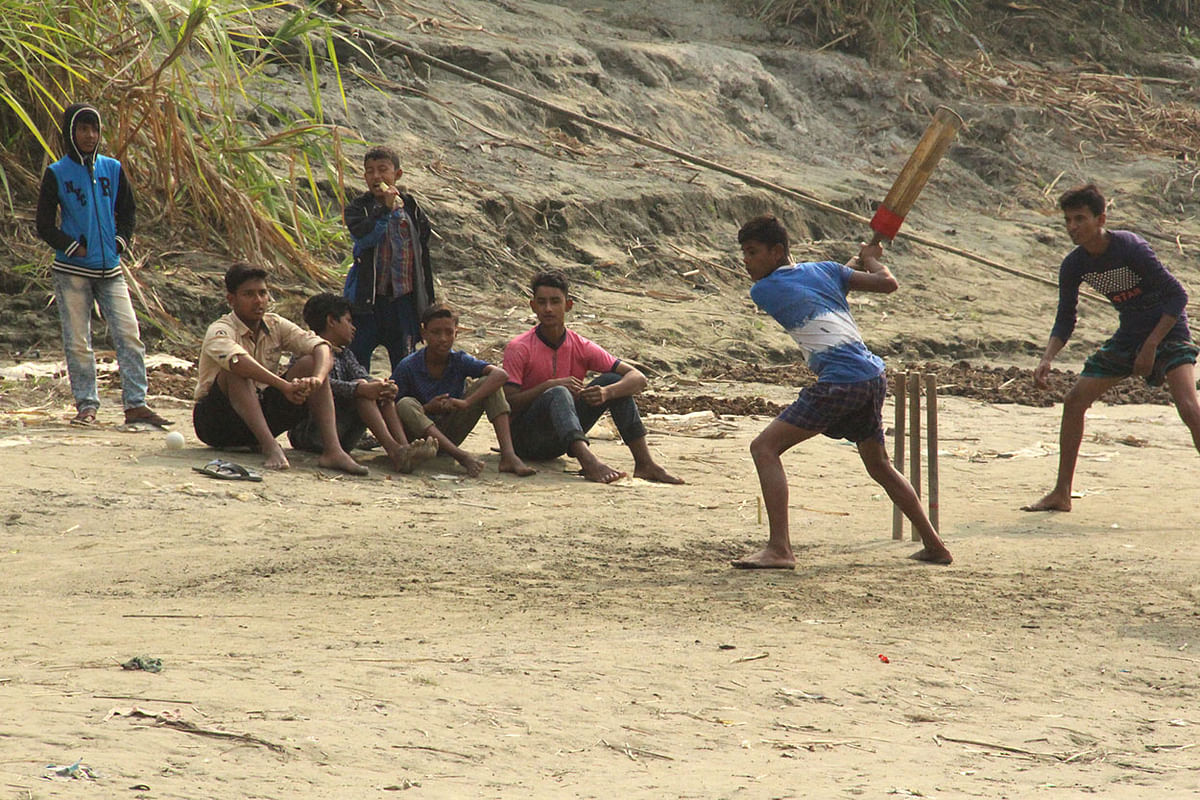 Children playing cricket in a village at Harirampur, Manikganj. Photo: Abdul Momin