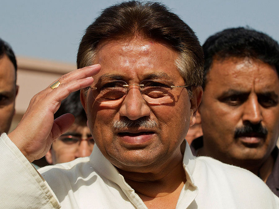 Pakistan`s former president and head of the All Pakistan Muslim League (APML) political party Pervez Musharraf salutes as he arrives to unveil his party manifesto for the forthcoming general election at his residence in Islamabad on 15 April, 2013. Photo: AFP