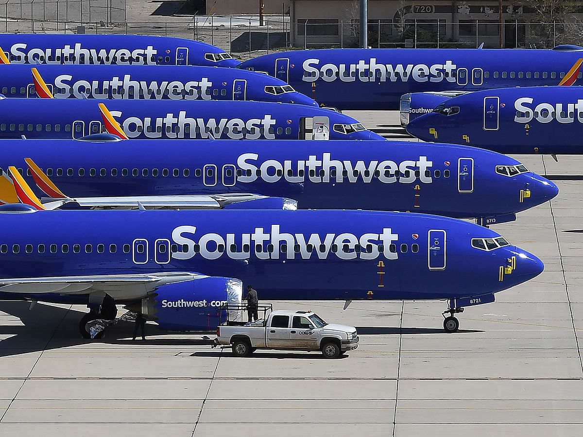 In this file photo taken on 28 March Southwest Airlines Boeing 737 MAX aircraft are parked on the tarmac after being grounded, at the Southern California Logistics Airport in Victorville, California. Photo: AFP