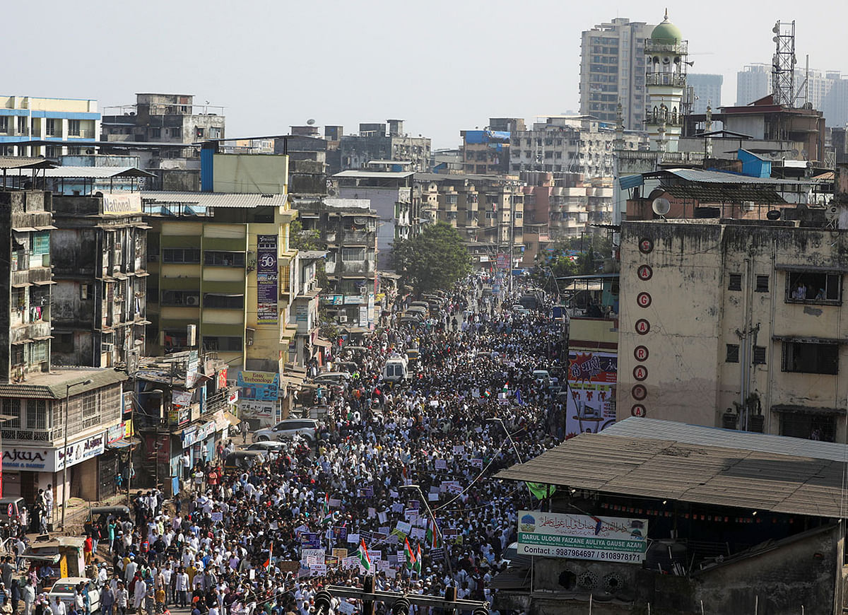Demonstrators walk during a protest march against a new citizenship law, on the outskirts of Mumbai, India, on 18 December 2019. Photo: Reuters