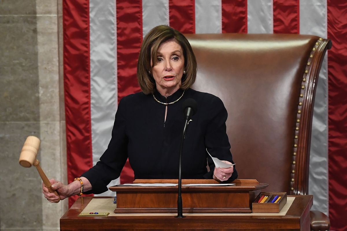 US Speaker of the House Nancy Pelosi presides over Resolution 755, Articles of Impeachment Against President Donald J. Trump as the House votes at the US Capitol in Washington, DC, on 18 December 2019. Photo: AFP