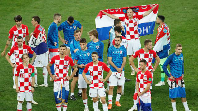 Croatia players look dejected after the match. Photo: Reuters
