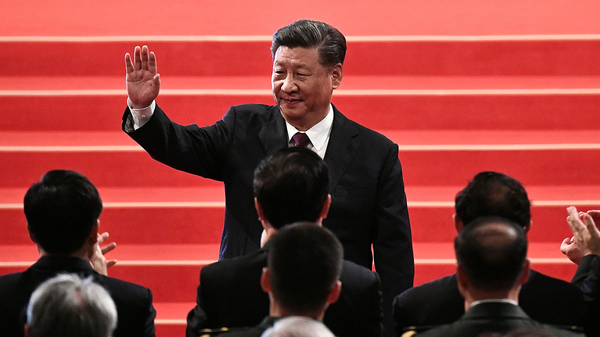 China`s president Xi Jinping waves as he departs following the inauguration ceremony of Macau`s new Chief Executive Ho Iat-seng as part of 20th anniversary handover celebrations, in Macau on 20 December. Photo: AFP