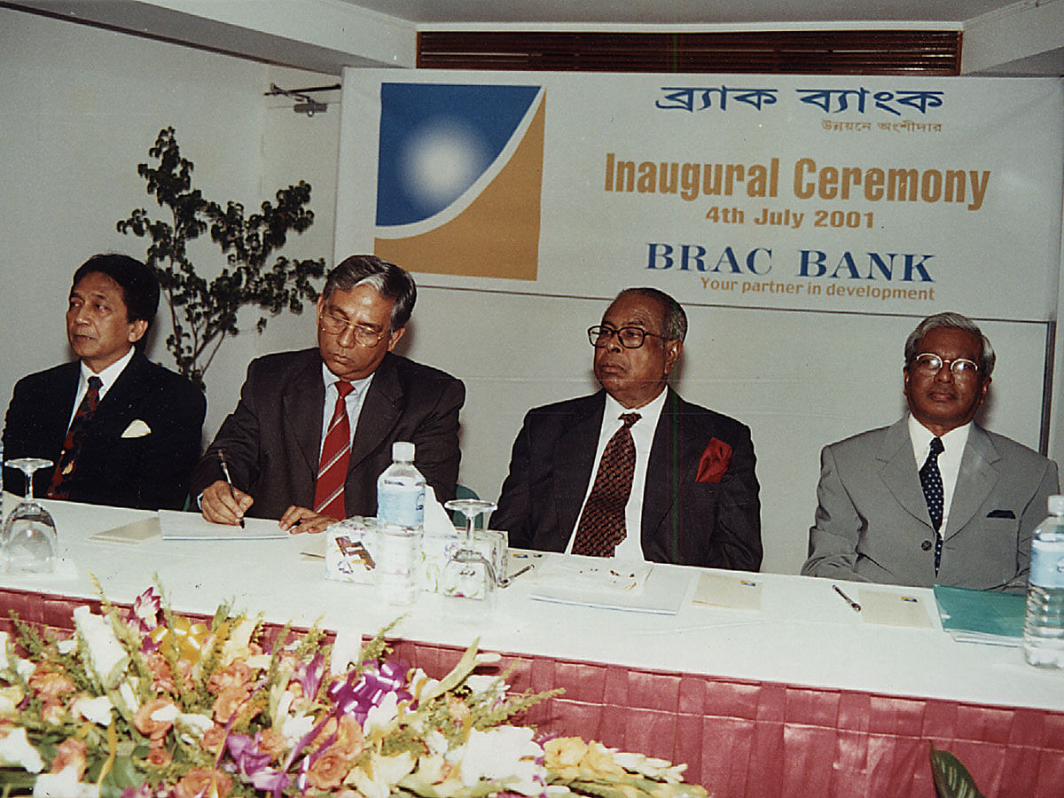 Sir Fazle Hasan Abed (R) during the inauguration of BRAC Bank in 2001. Photo: BRAC