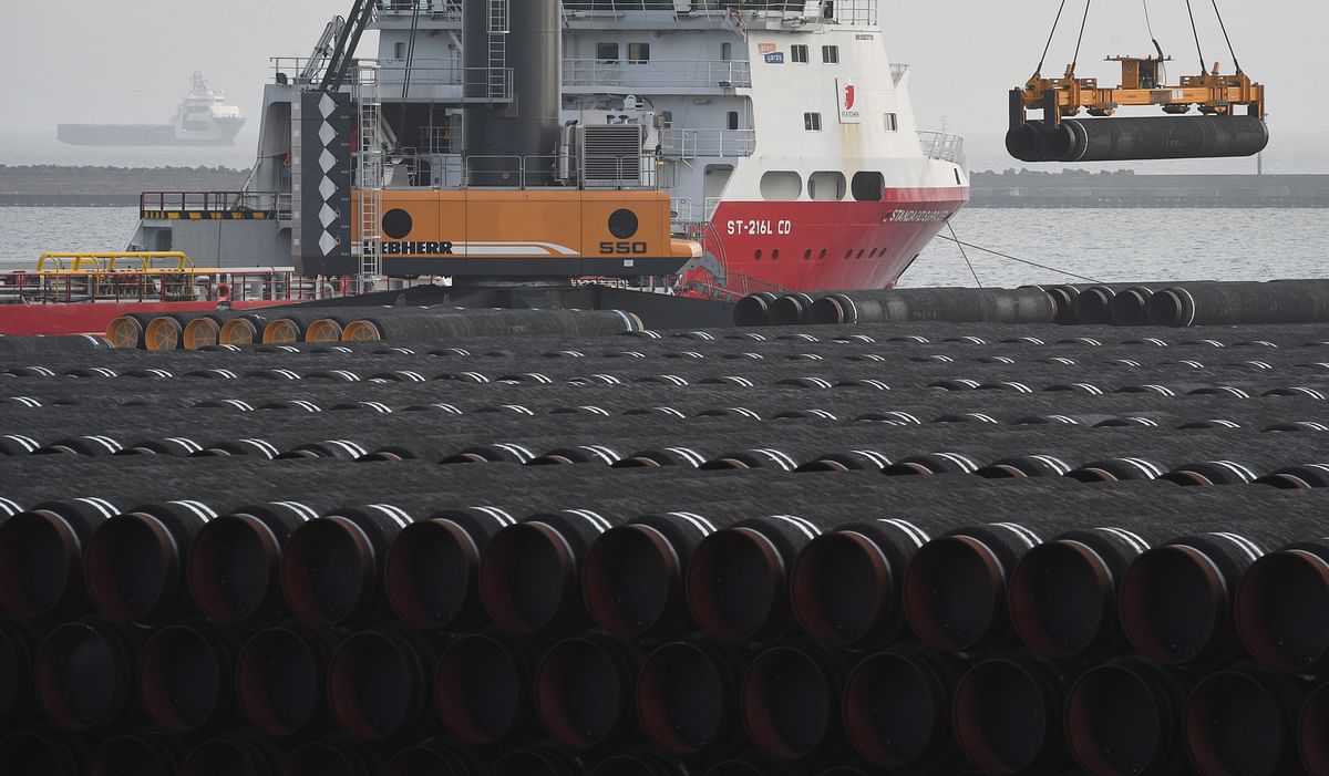 In this file photo taken on 11 December 2019 tubes for the construction of the Nord Stream 2 pipeline are being loaded on a ship at the Mukran port in Sassnitz on the Baltic Sea island of Ruegen, northeastern Germany. Photo: AFP
