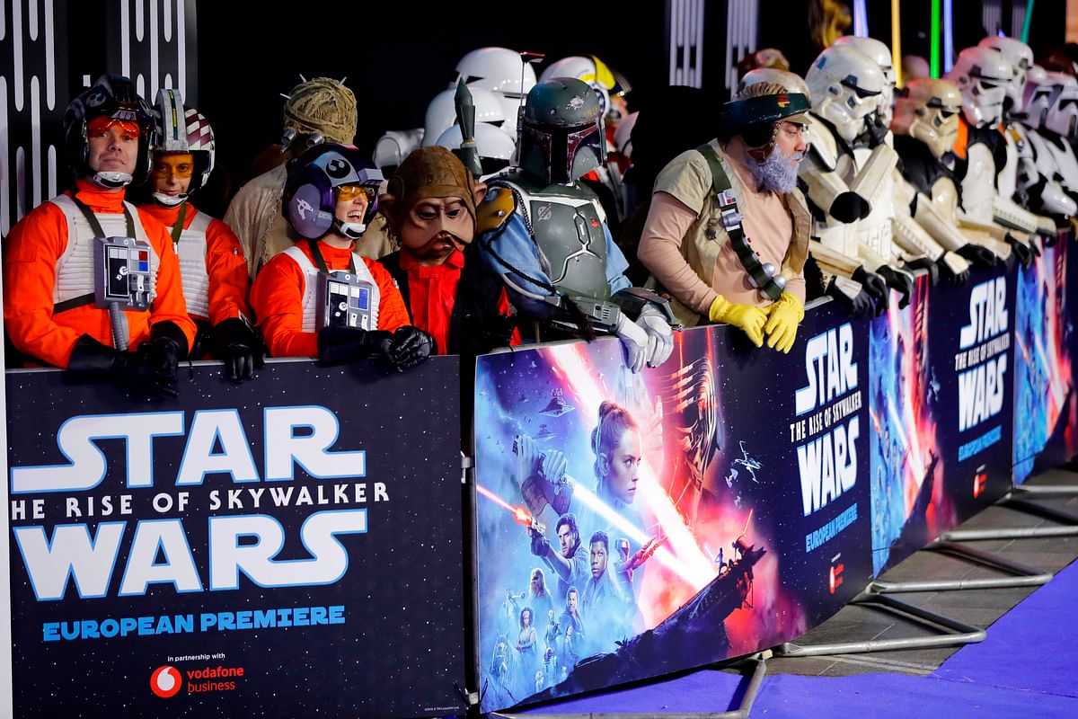 In this file photo taken on 18 December Fans dressed as Star Wars characters attend the European film premiere of Star Wars: The Rise of Skywalker in London. Photo: AFP