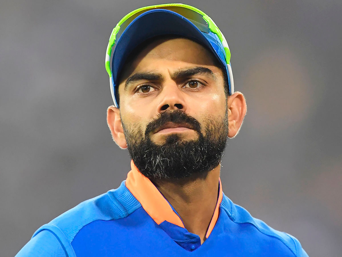 India`s captain Virat Kohli reacts during the third one day international cricket match of a three-match series between India and West Indies at the Barabati Stadium in Cuttack on 22 December, 2019. Photo: AFP