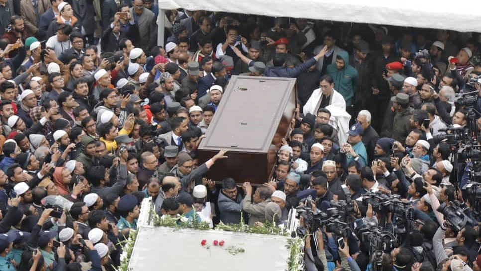 People carry the coffin of Sir Fazle Hasan Abed at Army Stadium, Dhaka on 22 December 2019. Photo: Dipu Malakar