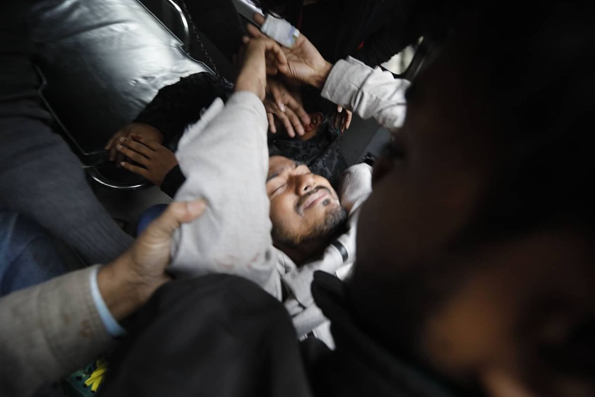 DUCSU VP Nurul Haque Nur being taken to DMCH after an attack allegedly by the activists of BCL and a faction of Muktijuddha Mancha on 22 December, 2019. Photo: Sayful Islam