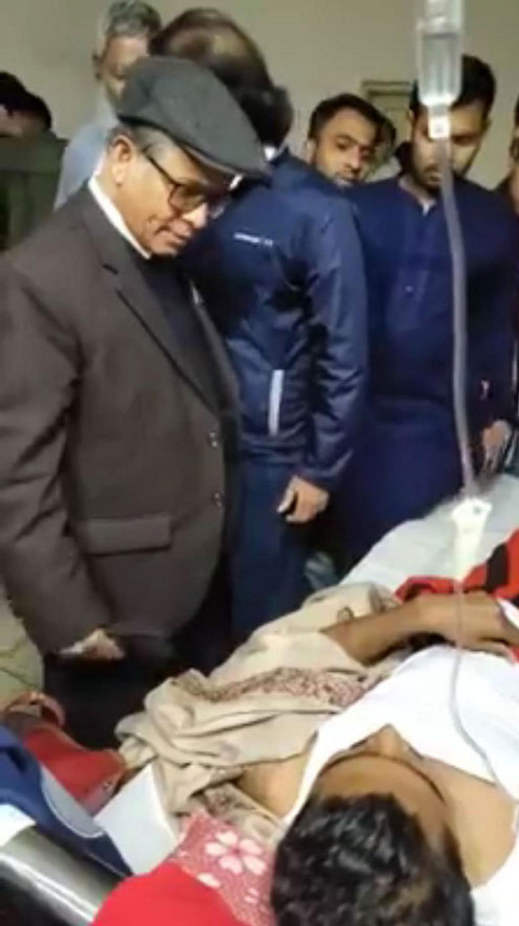 Dhaka University vice chancellor Md Akhtaruzzaman visits injured DUCSU vice president Nurul Haque in Dhaka`s Dhaka Medical College Hospital on 22 December, 2019. Photo: Video Grab