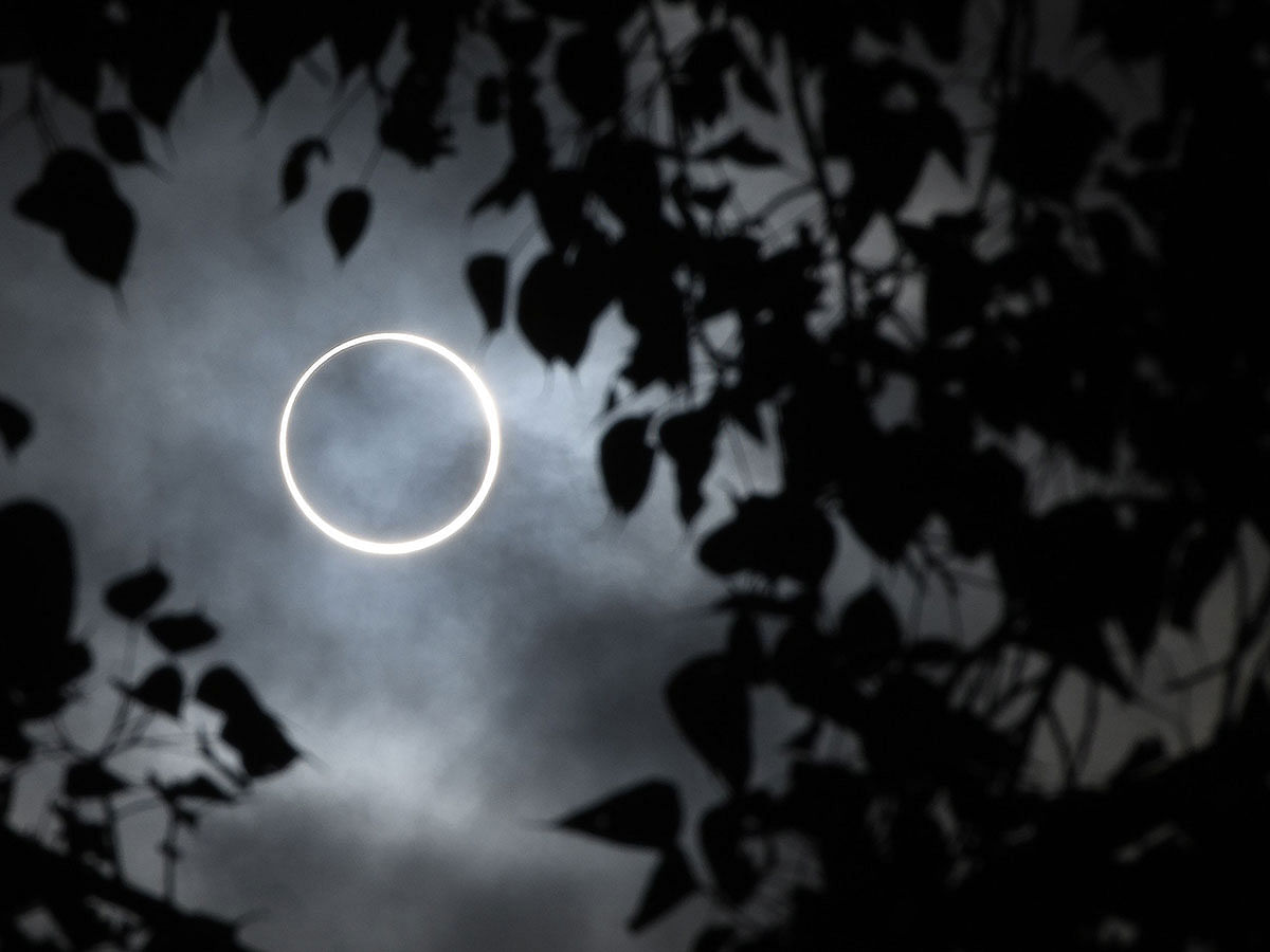 The moon totally covers the sun in a rare `ring of fire` solar eclipse as seen from the south Indian city of Dindigul in Tamil Nadu state on 26 December 2019. Photo: AFP Meta: Skywatchers from Saudi Arabia and Oman to India and Singapore were treated to a rare “ring of fire” solar eclipse Thursday