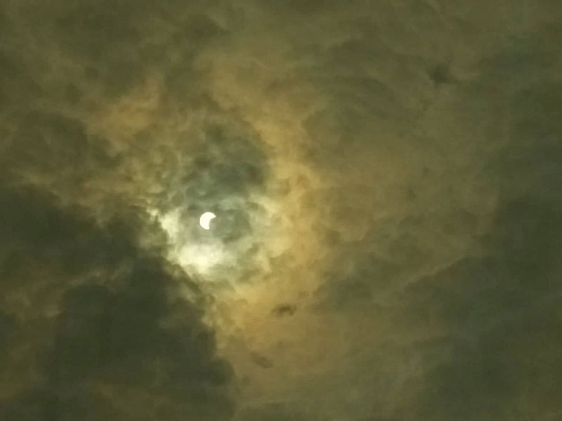 Annular solar eclipse occurs over the skies of Karwan Bazar, Dhaka, Bangladesh on 26 December 2019. Photo: Nusrat Nawrin