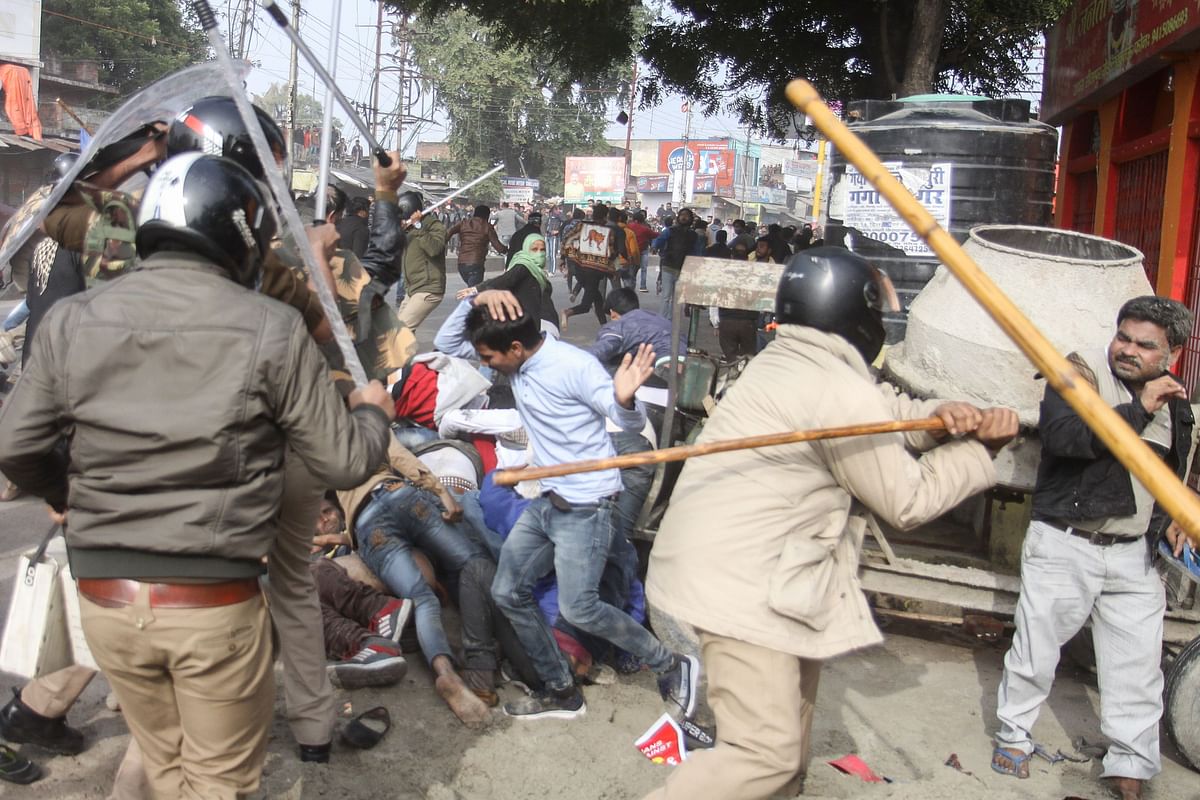 In this photo taken on 19 December police beat protesters with sticks during a demonstration against India`s new citizenship law in Lucknow. Photo: AFP