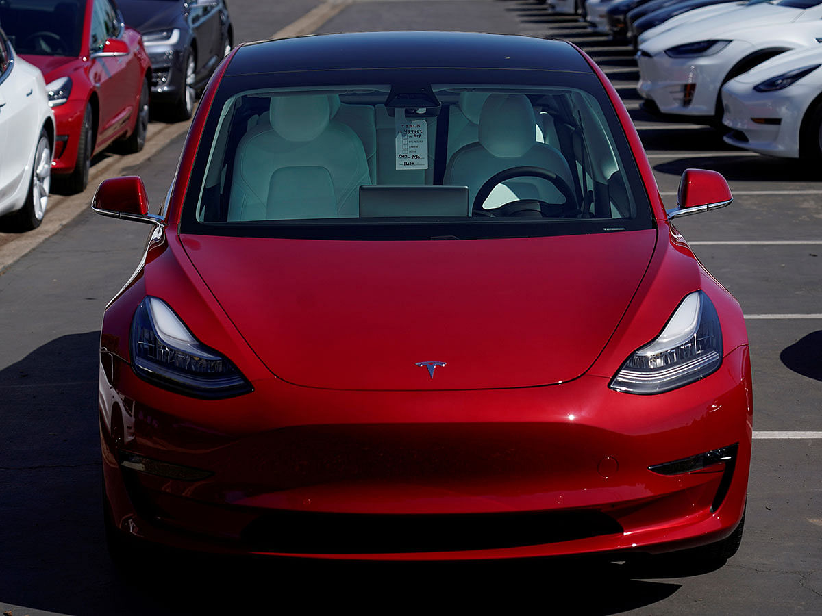 A new Tesla Model 3 is shown at a delivery center on the last day of the company`s third quarter, in San Diego, California on 30 September. Photo: Reuters