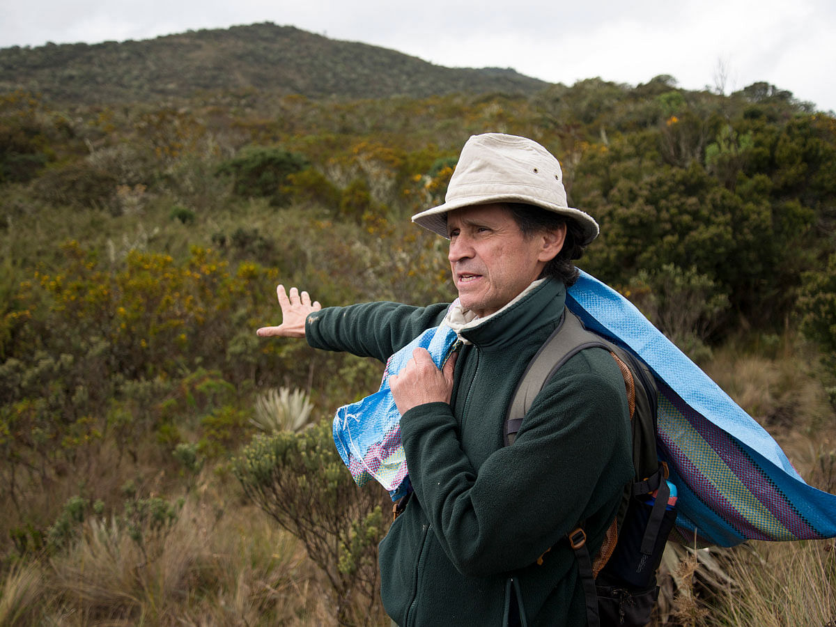 In this file photo taken on 1 October 2019 Colombian botanist Julio Betancur speaks on his way to the Chingaza National Natural Park, northeast of Bogota. Photo: AFP