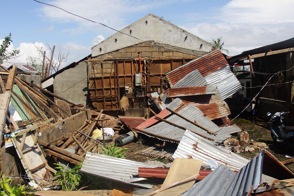 A house destroyed at the height of Typhoon Phanfone is seen in Balasan town in Iloilo province on 26 December 2019. Typhoon Phanfone swept across remote villages and popular tourist areas of the central Philippines on Christmas day claimed at least 16 lives, authorities said on 26 December. Photo: AFP