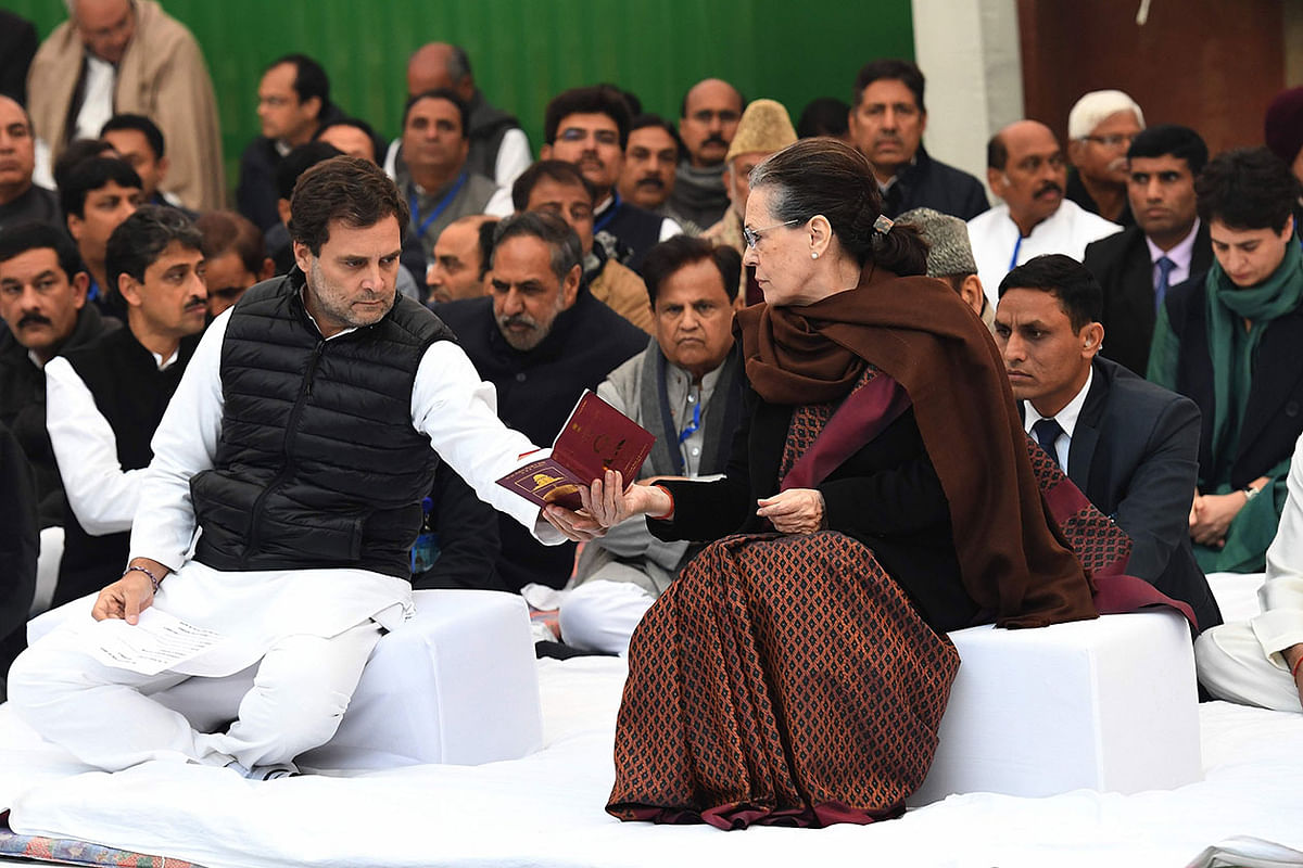 Congress president Sonia Gandhi (R) and ex-party president Rahul Gandhi attend a sit-in protest for ‘unity’ in New Delhi on 23 December 2019, amid widespread protests against India`s new citizenship law. Photo: AFP