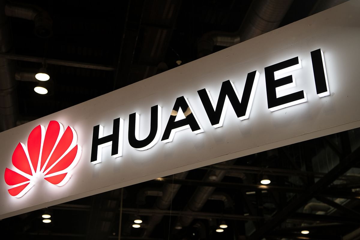 This file photo taken on 2 August shows the Huawei logo at the Consumer Electronics Expo in Beijing. Photo: AFP