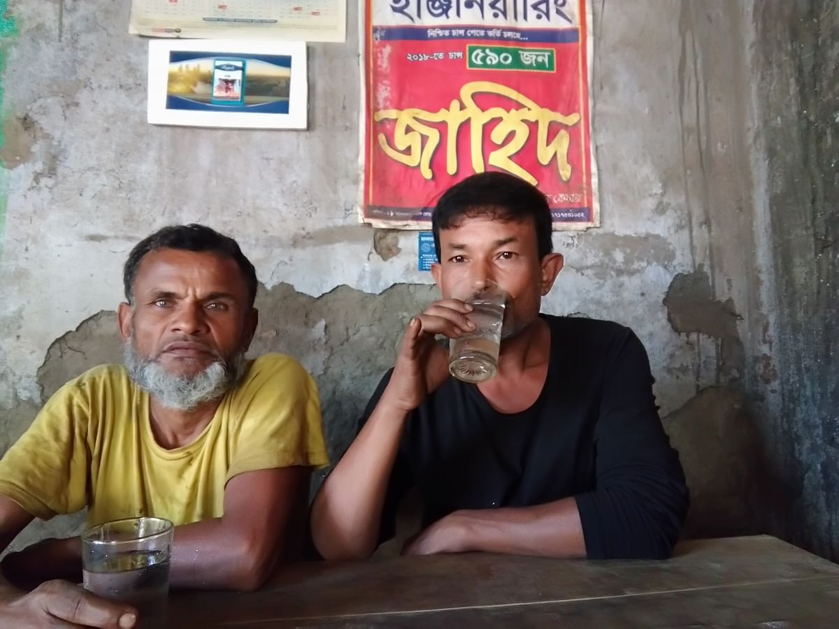 Shamsul Alam and Hasan Mia, both are victims of water poverty. Like most of the low-income group, they cannot afford to buy safe drinking water, hence depend on pourashava water supply. Photo: Collected