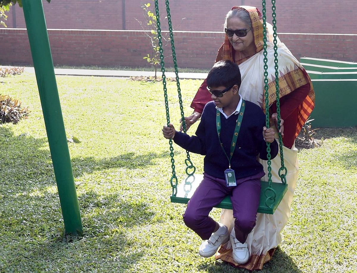 Prime minister Sheikh Hasina on Tuesday with children playing at her official Ganabhaban residence, Dhaka on 31 December 2019. Photo: PID
