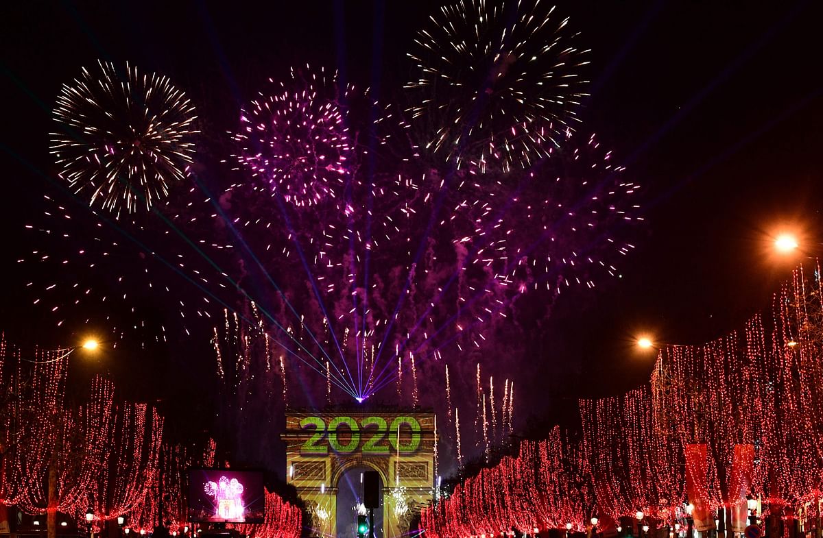 Fireworks light the sky over the Arc de Triomphe during the New Year`s celebrations on the Champs Elysees avenue, in Paris, on 1 January 2020. Photo: AFP