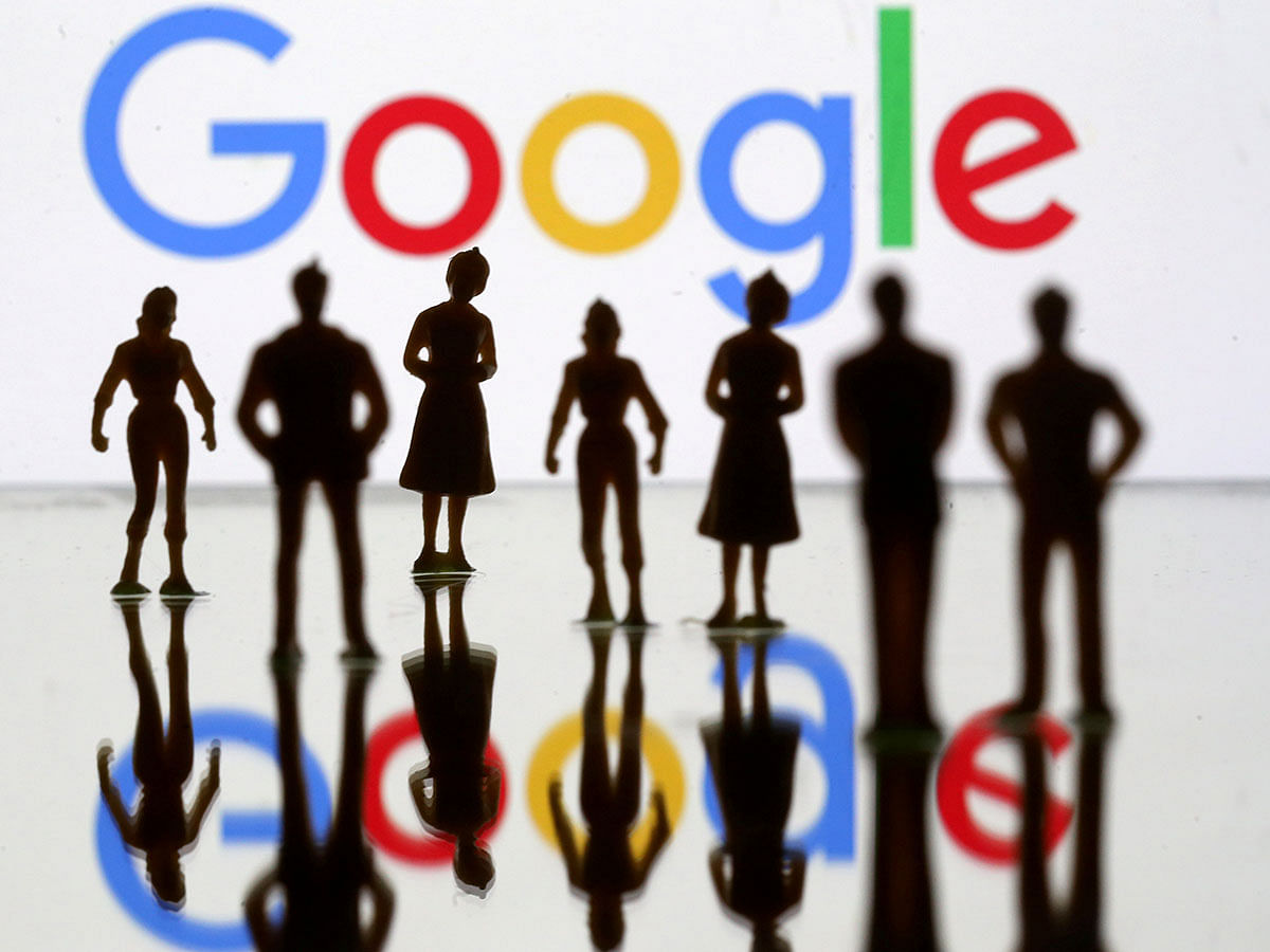 Small toy figures are seen in front of Google logo in this illustration picture on 8 April. Photo: Reuters