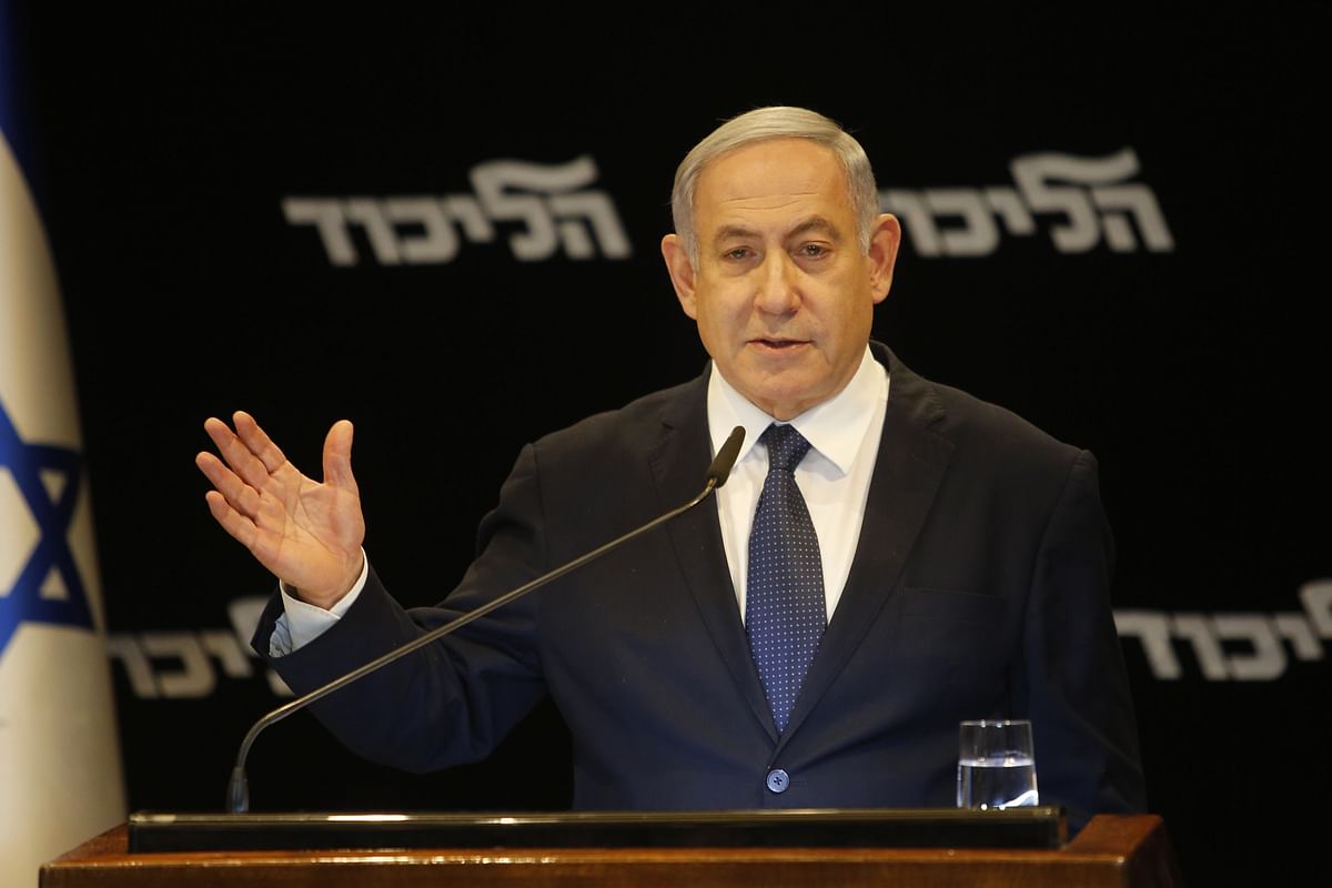 Israeli Prime Minister Benjamin Netanyahu leaves after delivering a statement regarding his intention to file a request to the Knesset for immunity from prosecution, in Jerusalem on 1 January. Photo: AFP