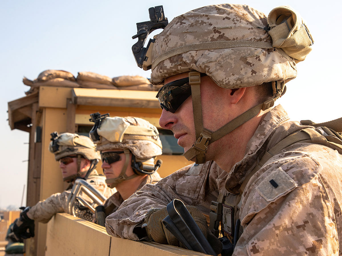 US Marines with 2nd Battalion, 7th Marines, assigned to the Special Purpose Marine Air-Ground Task Force-Crisis Response-Central Command (SPMAGTF-CR-CC) 19.2, provide security at the US embassy compound in Baghdad, Iraq, on 3 January 2020. Photo: Reuters