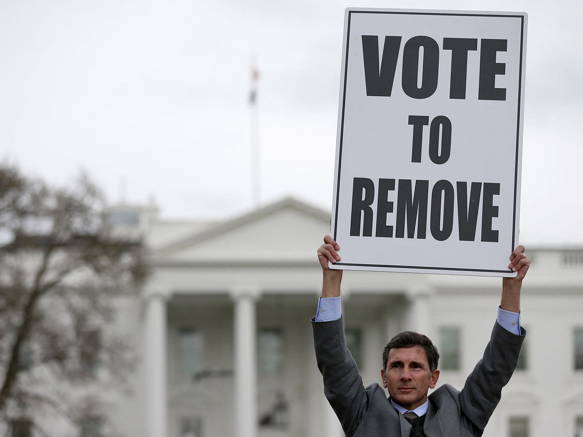 A protester stands outside the White House in Washington, US, on 3 January 2020. Photo: Reuters