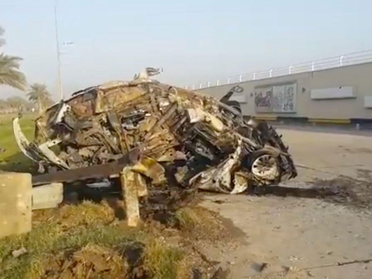 A damaged car, claimed to belong to Qassem Soleimani and Abu Mahdi al Muhandis, is seen near Baghdad International Airport, Iraq on 3 January 2020 in this still image taken from video. Photo: Reuters