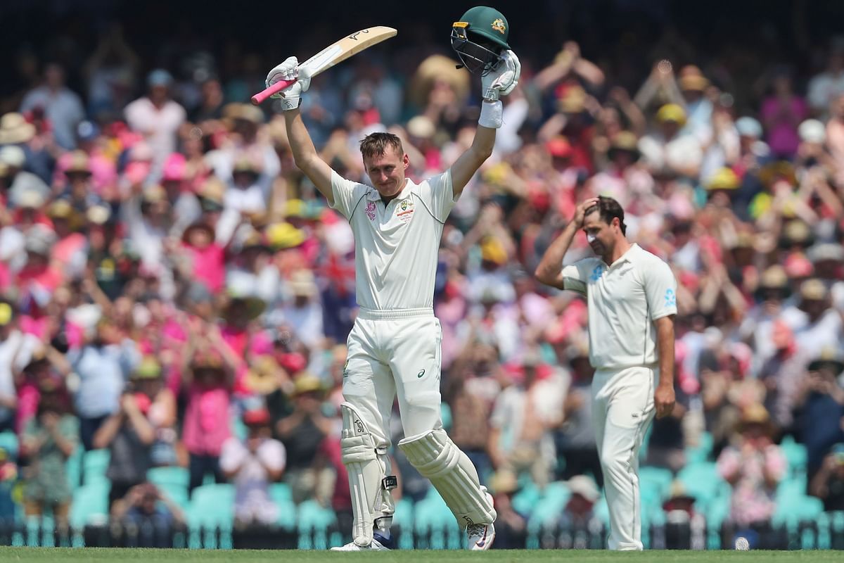 Australia’s Marnus Labuschagne (C) celebrates scoring a double century during the second day of the third cricket Test match between Australia and New Zealand at the Sydney Cricket Ground in Sydney on 4 January 2020. Photo: AFP