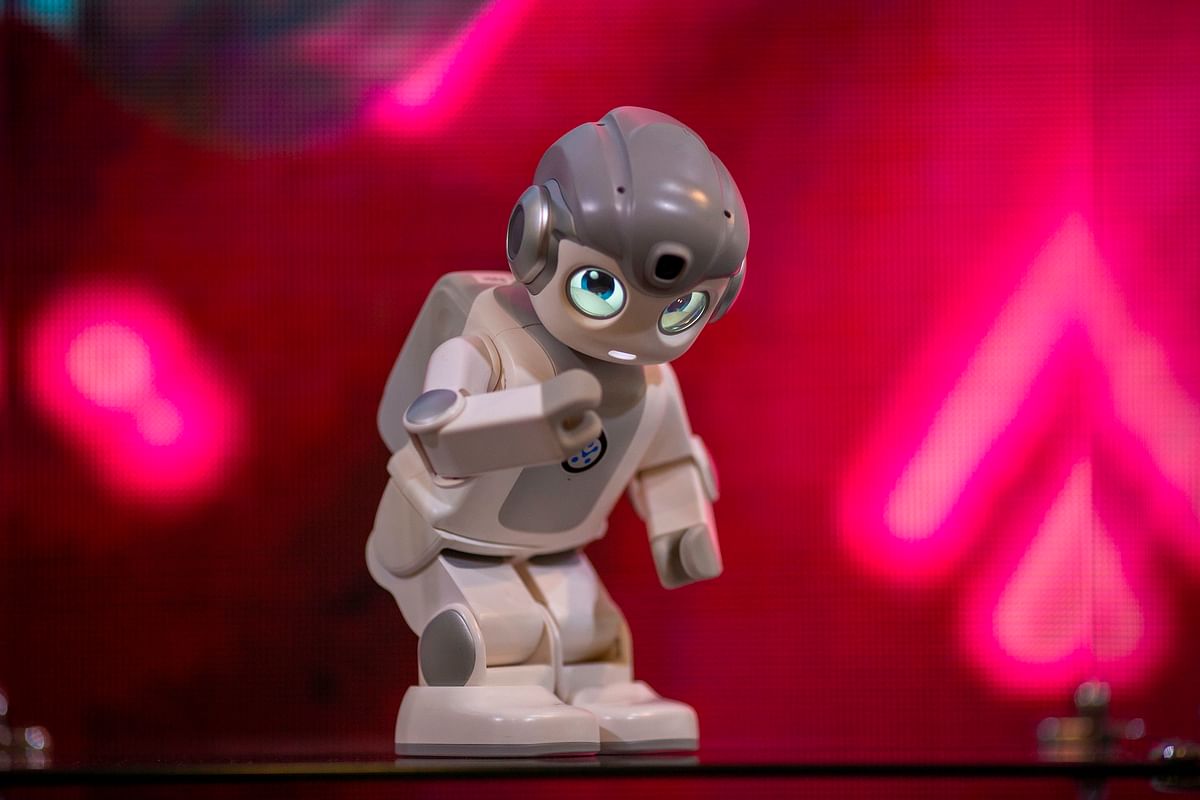 In this file photo taken on 10 January 2019, an Alpha Mini robot that use artificial intelligence dances at the Las Vegas Convention Center during CES 2019 in Las Vegas. Photo: AFP