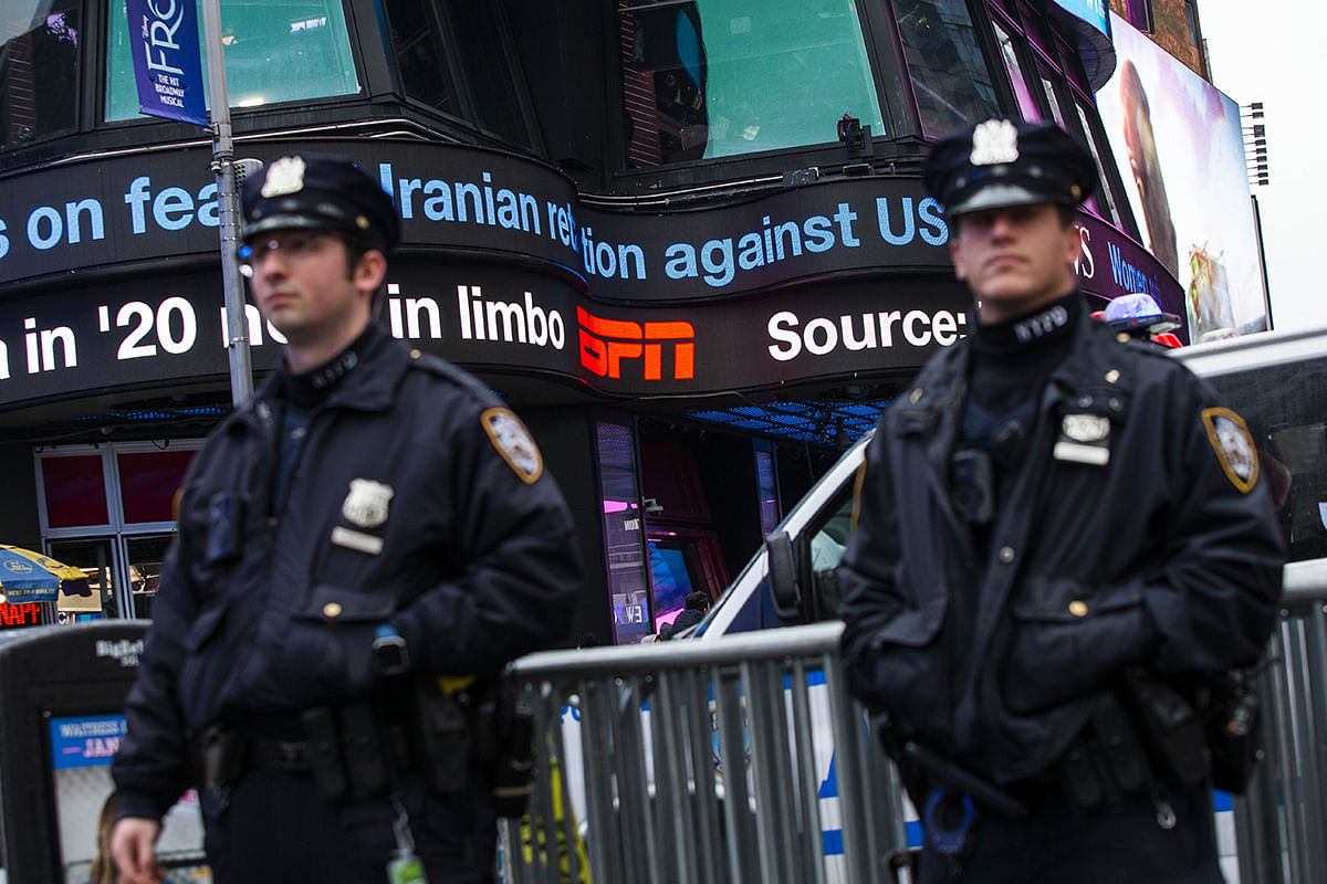NYPD officers stand guard at Times Square on 3 January, 2020 in New York City. Photo: AFP