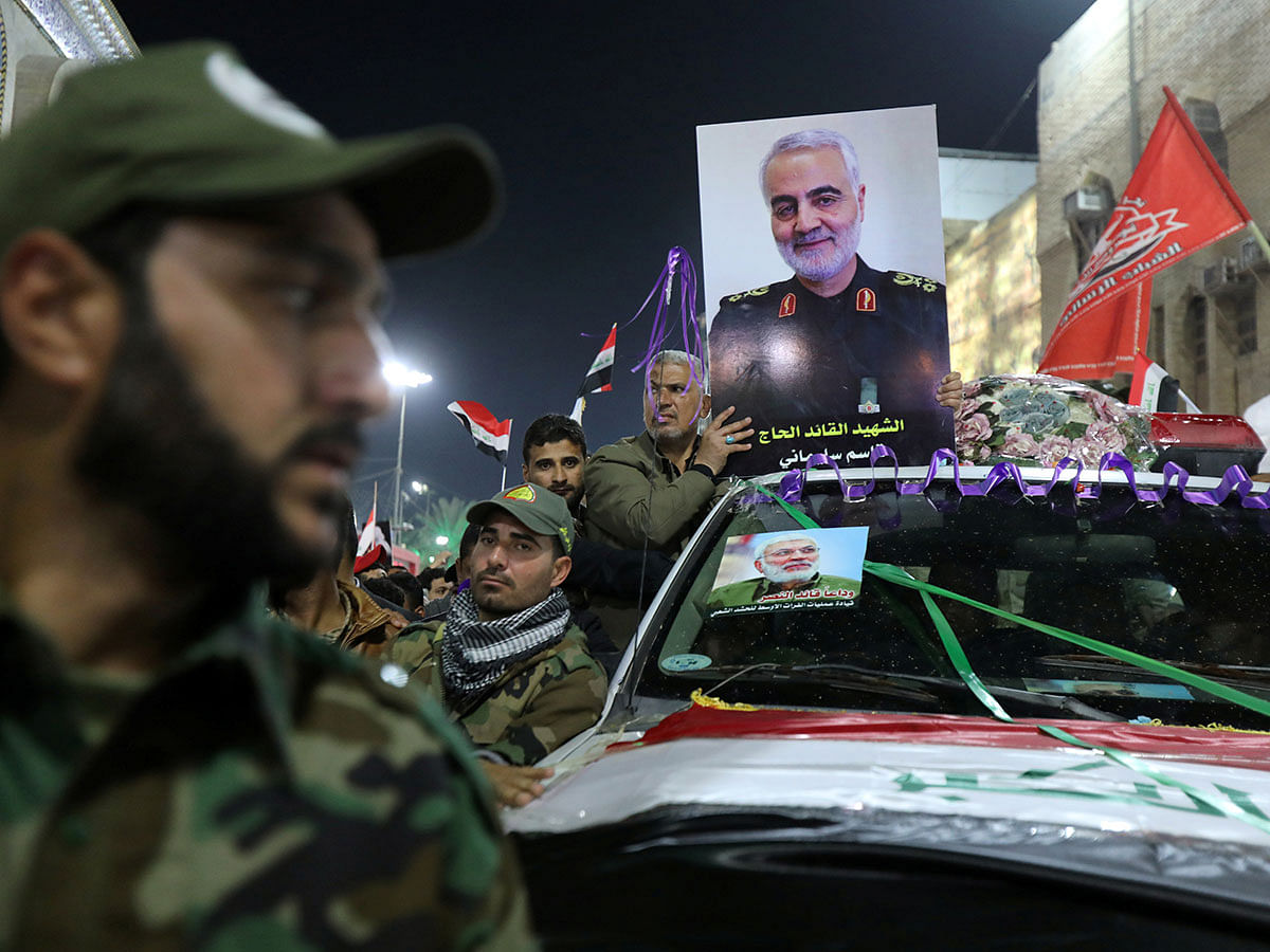 Mourners attend the funeral procession of the Iranian major-general Qassem Soleimani, head of the elite Quds Force of the Revolutionary Guards, and the Iraqi militia commander Abu Mahdi al-Muhandis, who were killed in an air strike at Baghdad airport, in Kerbala, Iraq, on 4 January 2020. Photo: Reuters