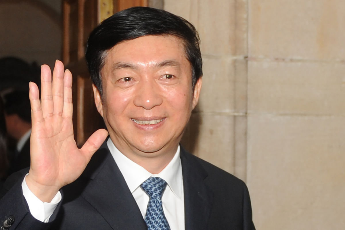 In this file photo taken on 17 February, 2012, governor of China`s Qinghai province Luo Huining waves as he leaves after meeting with Indian Minsiter of External Affairs SM Krishna (unseen) in New Delhi. Photo: AFP